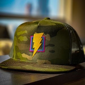 Camo retro trucker hat with lightning bolt